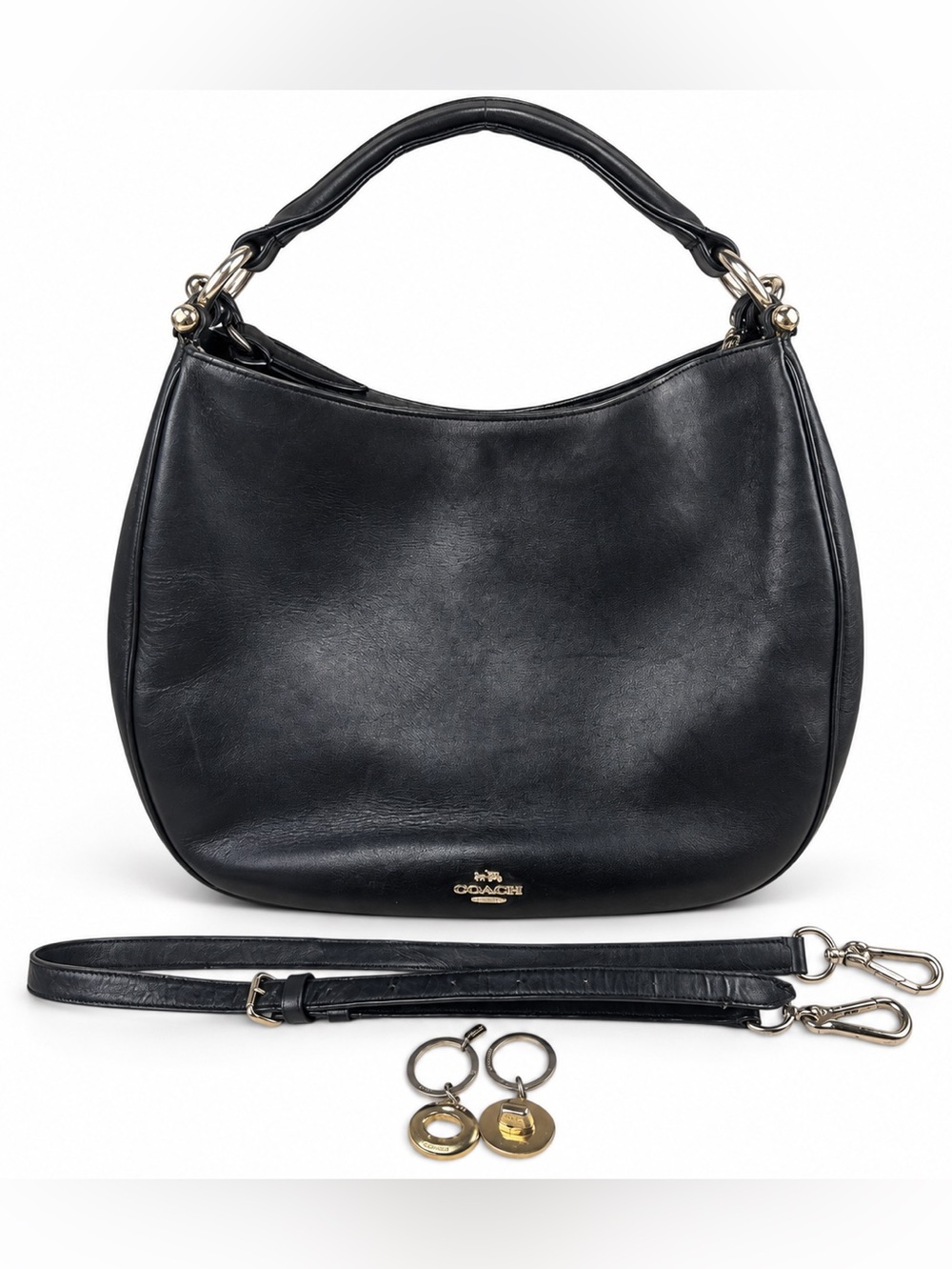 Coach Nomad Black Leather Hobo Shoulder Bag with Crossbody Strap and Coach Charm